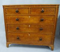 A Victorian oak chest of drawers