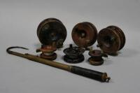 A selection of wooden and Bakelite fishing reels