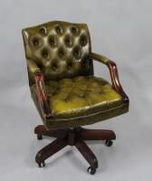 A leather Chesterfield style office chair
