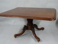 A Victorian mahogany dining table