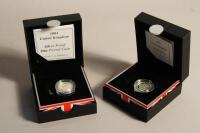 The Royal Mint set of two Millennium Silver £5 coins.