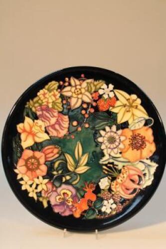 A modern Moorcroft charger