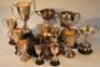 A collection of silver plated prize cups