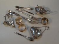 A collection of silver flatware and hollow ware items