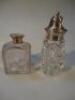 A silver capped glass sugar sifter and cut glass scent bottle. (2).