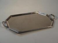 An octagonal silver plated two handled tray