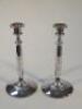 A pair of early 20thC electroplated candlesticks 28cm high.