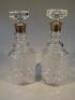 A pair of modern cut glass and silver collared decanters