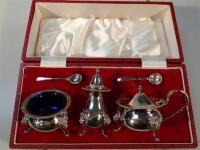 An Elizabeth II three-piece condiment set