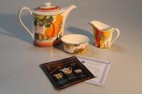 A Wedgwood Clarice Cliff collection Art Deco style three piece tea service.