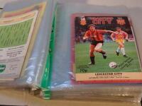 A collection of various football programmes teams include