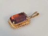 A 9ct gold and amethyst pendant