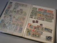 A stock book and collection of stamps for African countries