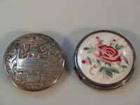 A white metal ladies compact engraved with the bell of Bethlehem