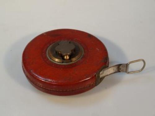 A Rabone and Sons leather cased steel tape measure.