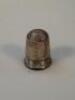 A silver thimble by Charles Horner