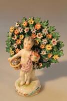 A 19thC Chelsea porcelain figure of a putti