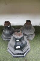 Three cast iron gutter hoppers.