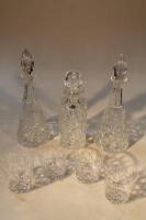 A pair of Brierley cut glass conical decanters