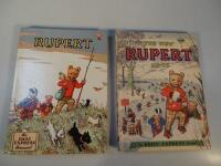 A 1950 and 1956 Rupert the Bear annual.