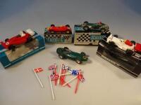 Five Scalextric racing cars