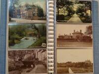 Three postcard albums of humorous and topographical scenes.