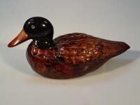 A pottery duck decoy