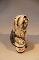 A Royal Doulton figure of the Dulux dog