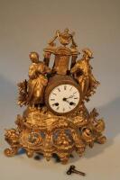 A late 19thC French ormolu and gilt clock