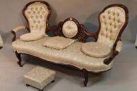 A Victorian scroll back sofa