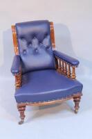 A late Victorian button back easy chair.