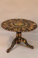 A 19thC decoupage circular occasional table