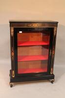 A Victorian ebonised small pier cabinet