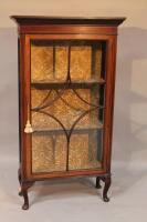 An Edwardian small china cabinet.