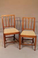 A matched pair of 18thC country dining chairs.