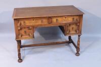 A Carolean revival oak desk