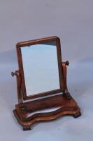 A Victorian dressing table mirror