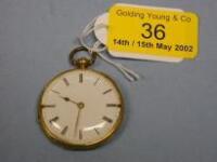 A yellow metal lady's open face fob watch