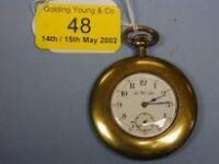 A gold plated slim open faced dress pocket watch with enamel dial having Arabic numerals