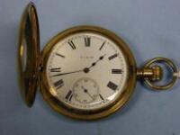 An Elgin gold plated half hunter pocket watch