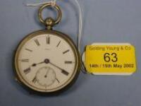 A silver open face pocket watch with white enamel dial