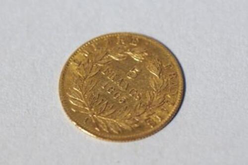 A gold 5 Franc Napoleon coin