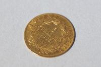 A gold 5 Franc Napoleon coin