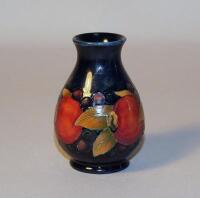 A Moorcroft 'Pomegranite' pattern baluster vase