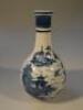 A 19thC Chinese export blue and white bottle vase