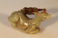 A Chinese hardstone carved figure of a horse being ridden by a monkey