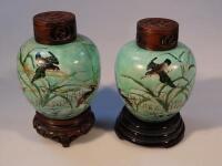 A pair of famille vert export ginger jars