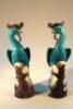 A pair of 20thC Chinese moulded figures of Phoenix birds