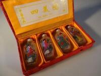 Four modern glass Chinese snuff bottles depicting courtesans.