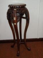 A Chinese hardwood jardiniere stand